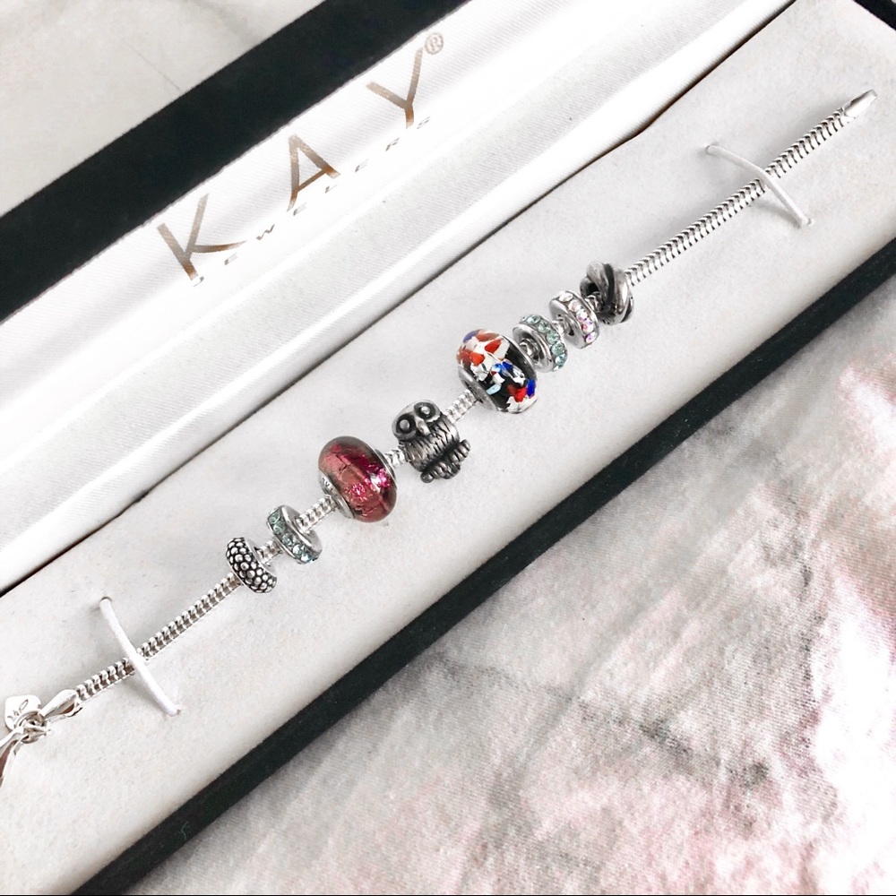 PRICE NEGOTIABLE - Pandora Bracelet with 8 Charms